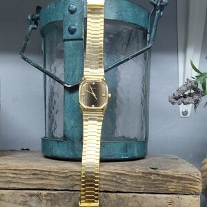 Vintage Gold Geneva Wristwatch with Running Tigers Eye Dial